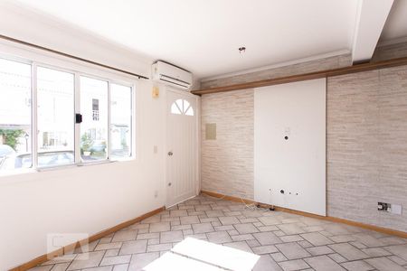 Sala de casa de condomínio à venda com 2 quartos, 90m² em Cavalhada, Porto Alegre
